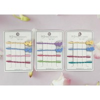 B-057  CARTON PINZA CABELLO EN HIERRO COLORES RECTO ESTAMPADAS